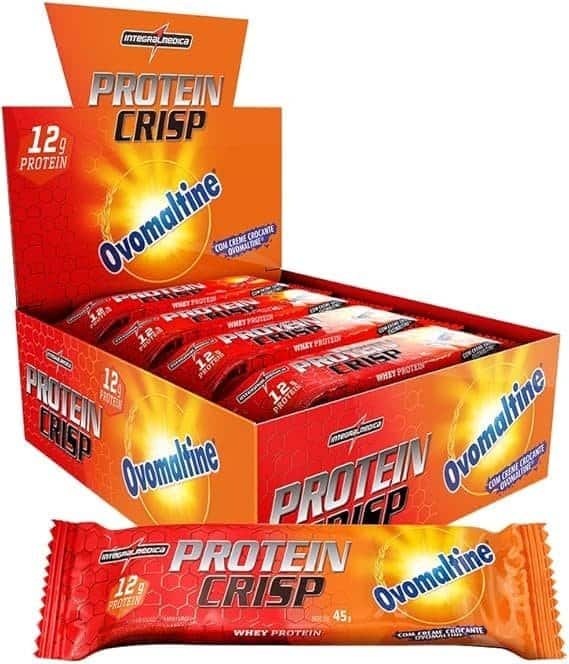 5890bbb.jpg Integralmedica - Barra de Proteína Whey Protein Crisp Bar Ovomaltine - Snack Proteíco - Pré e Pós-Treino - 12 Unidades - Imagem 1
